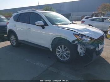  Salvage Mazda Cx