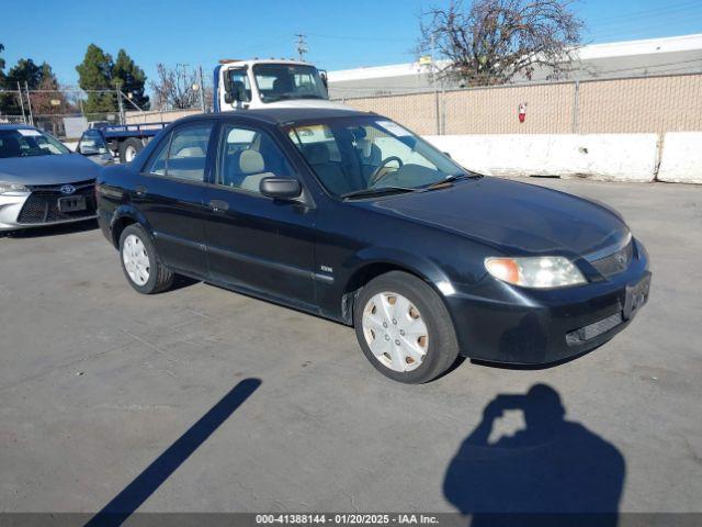  Salvage Mazda Protege