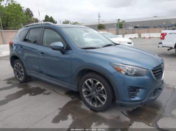  Salvage Mazda Cx