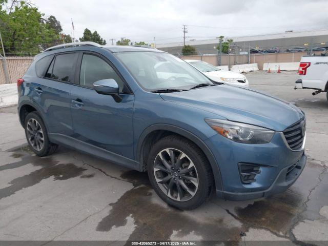  Salvage Mazda Cx
