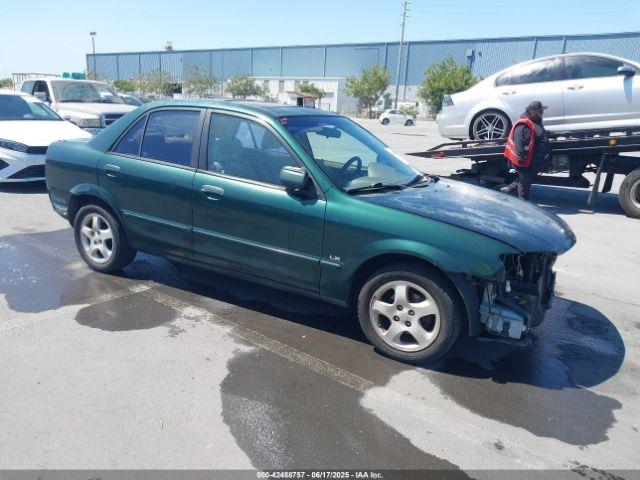  Salvage Mazda Protege