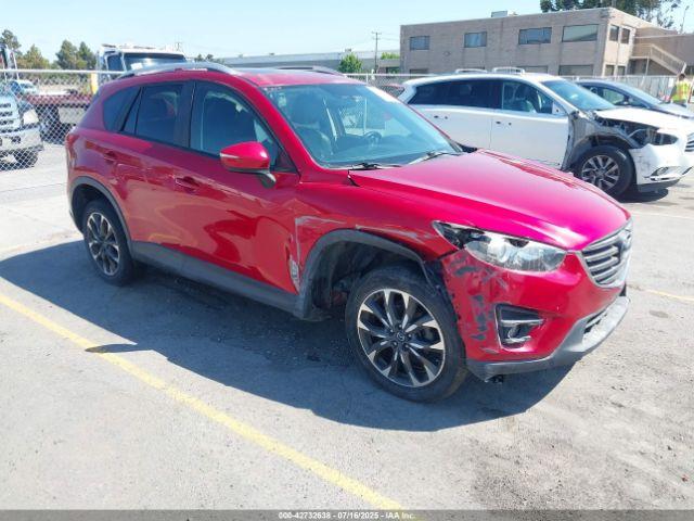  Salvage Mazda Cx