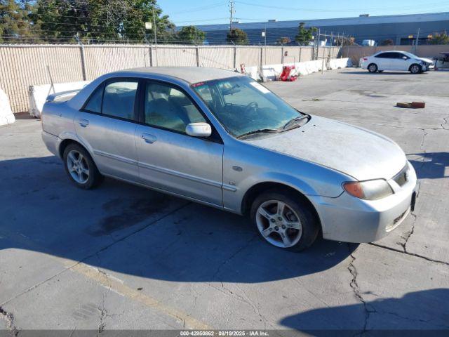  Salvage Mazda Protege